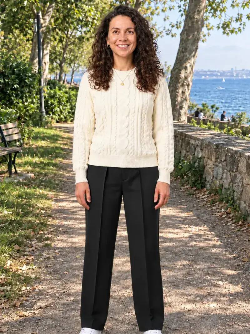 After: the same model trying on a cream cable-knit jumper and black trousers from the demo catalogue
